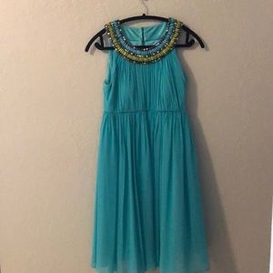 Tea length teal dress